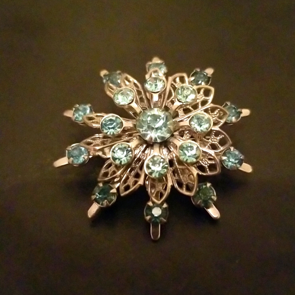 Small Snowflake Silver Tone Brooch with Pale Blue Rhinestones